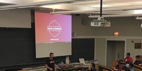 Hack-A-Startup kickoff in a Tepper lecture hall